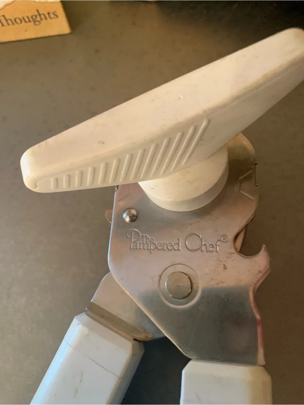 The Pampered Chef safety smooth edge, manual WHITE and SILVER can opener.